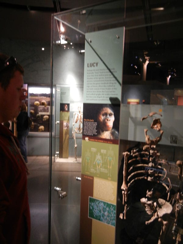 Daniel standing next to one of his ancestors
