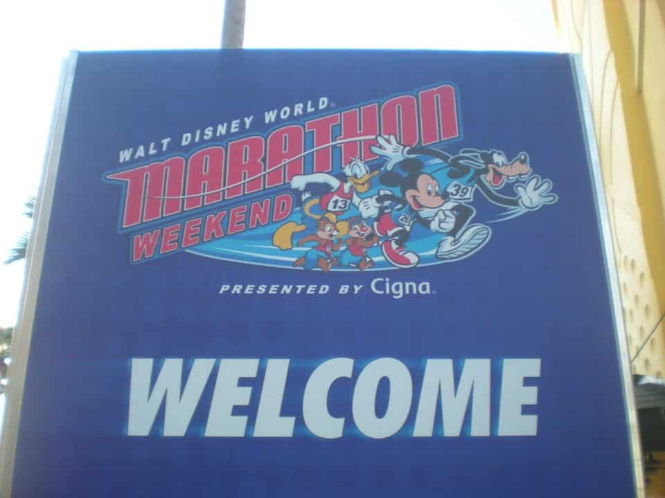 Walt Disney World Marathon Weekend welcome banner presented by Cigna featuring Disney characters.